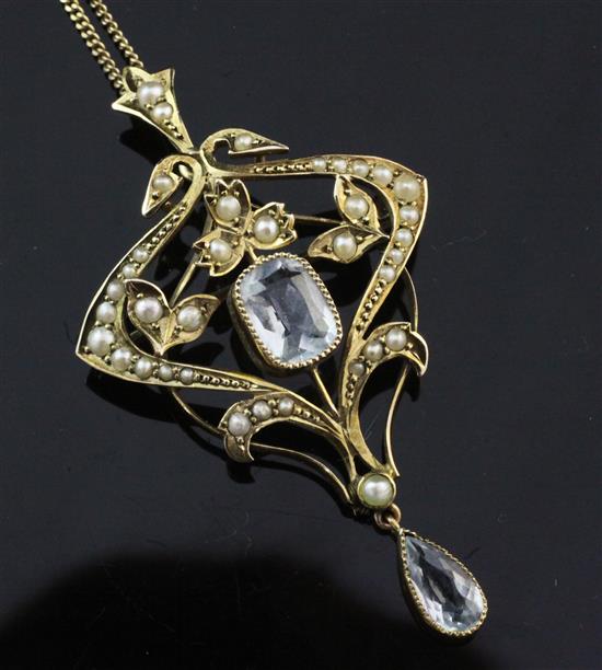 An Edwardian 9ct gold, aquamarine and split pearl drop pendant brooch, pendant 2in.